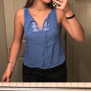 tie up light blue tank top with white embroidery